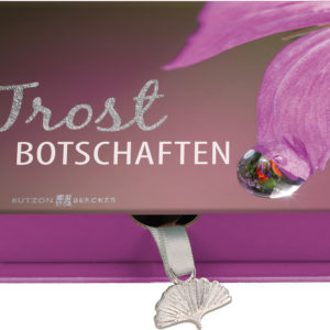 Eine lila Schachtel mit Botschaften und Muschel-Anhänger wirbt emotional für Butzon Bercker.